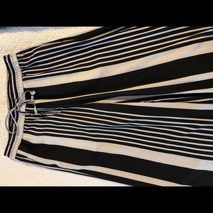 Wide leg polyester off white and black striped pants with pockets